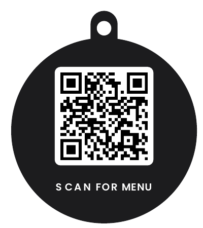 A black keychain disc printed with a QR code and the words Scan for menu.
